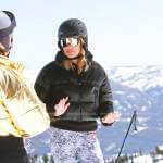 Whitney’s black puffer jacket and printed ski pants on The Real Housewives of Salt Lake City