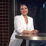 Adrienne’s white roll-up sleeve jacket on E! News