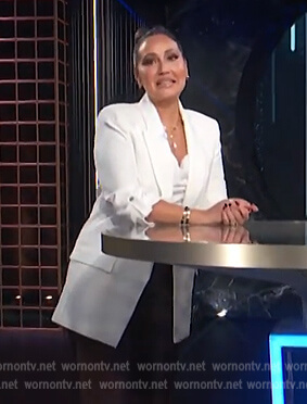 Adrienne's white roll-up sleeve jacket on E! News