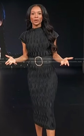 Zuri’s black pleated top and skirt on Access Hollywood