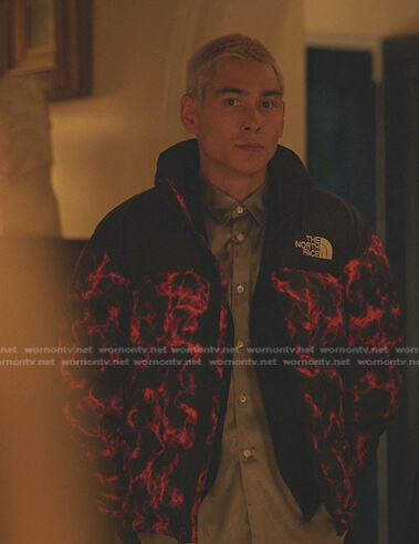 Aki's red and black printed puffer jacket on Gossip Girl