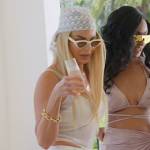 Alexia’s white cats eye sunglasses on The Real Housewives of Miami