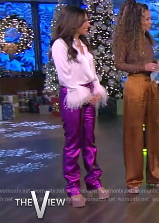 Alyssa’s feather cuff blouse and purple metallic jeans on The View