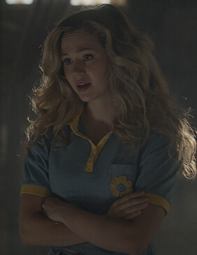 Courtney’s blue floral patch polo on Stargirl