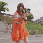 Emily’s orange printed tunic dress on Emily in Paris