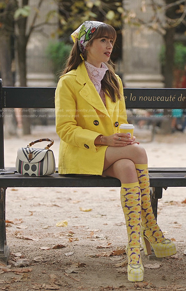 Emily's yellow jacket and eyelet blouse on Emily in Paris