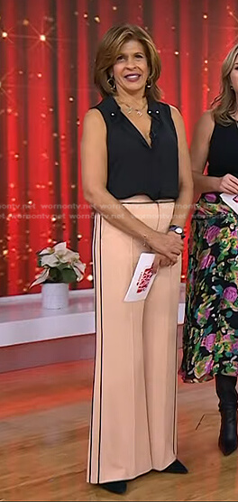 Hoda's black top and pink pants with contrast piping on Today
