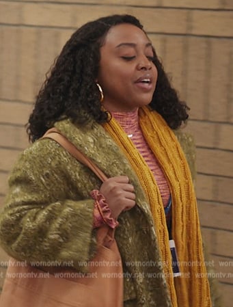 Janine’s mustard jacquard coat on Abbott Elementary