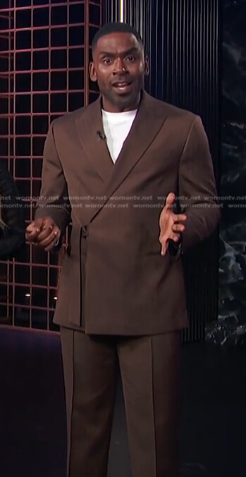 Justin's brown wrap blazer on E! News