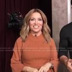 Kit’s brown ribbed sweater and plaid skirt on Access Hollywood