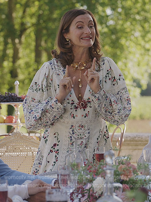Louise's white floral embroidered dress on Emily in Paris