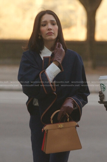 Luna’s navy leather contrast poncho on Gossip Girl