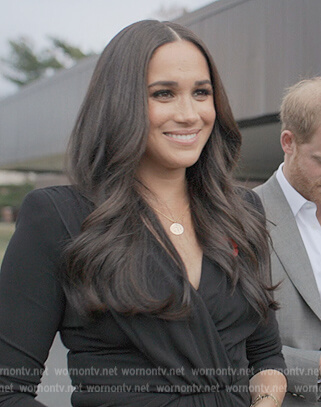 Meghan Markle's black wrap front dress on Harry and Meghan