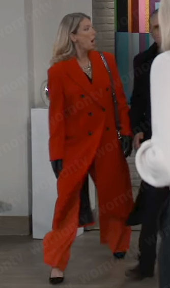 Nina’s long orange-red coat on General Hospital