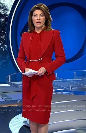 Norah’s red chain embellished blazer on CBS Evening News