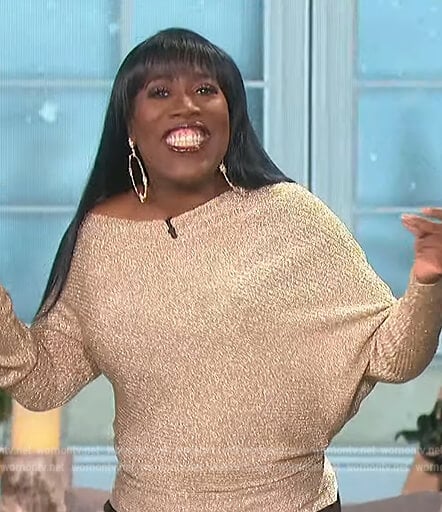Sheryl’s metallic ribbed off shoulder top on The Talk