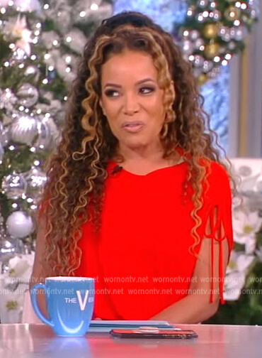 Sunny’s red smocked waist dress on The View