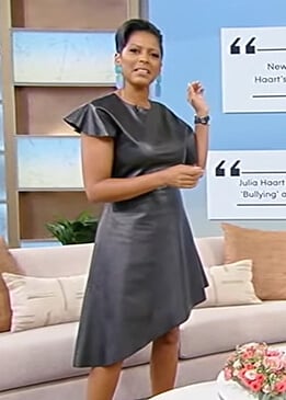 Tamron’s black leather asymmetric dress on Tamron Hall Show