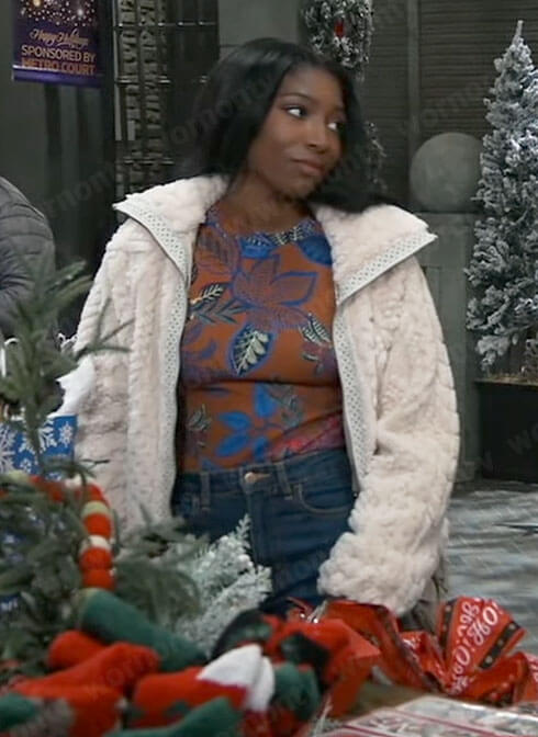 Trina's leaf print top and white fluffy jacket on General Hospital