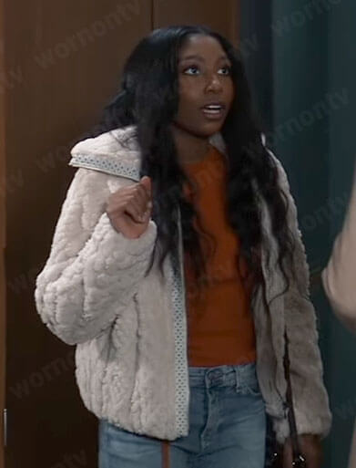 Trina’s orange drawstring knit top and furry jacket on General Hospital