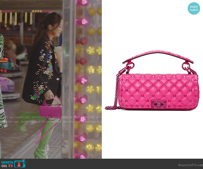 Pink Rockstud Spike Shoulder Bag by Valentino Garavani worn by Mindy Chen (Ashley Park) on Emily in Paris