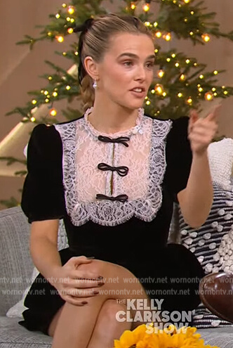 Zoey Deutch’s black contrast lace mini dress on The Kelly Clarkson Show