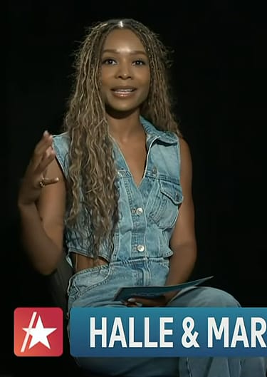 Zuri's cutout denim jumpsuit on Access Hollywood