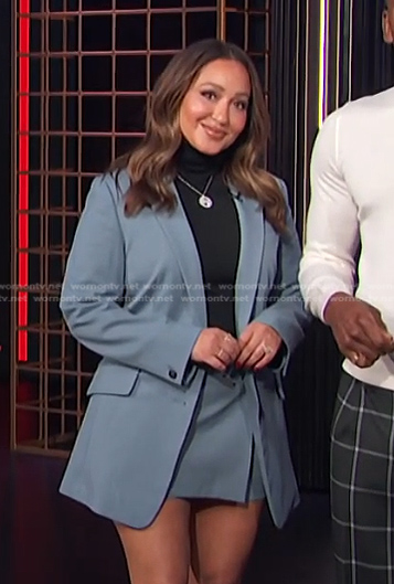 Adrienne’s blue blazer and mini skirt on E! News