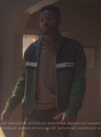 Aaron's green zip down jacket on Grown-ish
