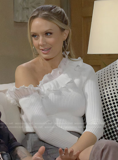 Abby’s white ruffled one-shoulder top on The Young and the Restless