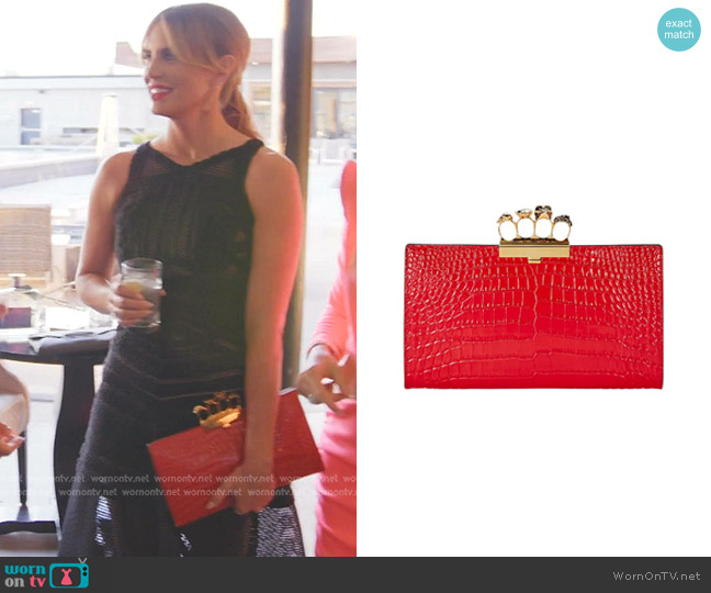 Alexander McQueen Skull Four Ring Embossed Leather Clutch worn by Whitney Rose on The Real Housewives of Salt Lake City