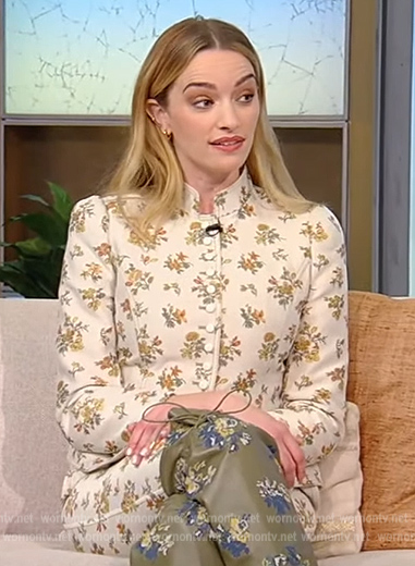 Brianne Howey’s white floral blouse and pants on Tamron Hall Show