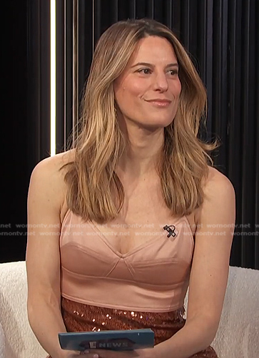Brooke Jaffe’s beige top and sequin skirt on E! News