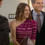 Chloe’s magenta one-shoulder studded top and skirt on The Young and the Restless