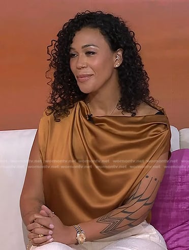 Devi Brown’s orange satin top on Today