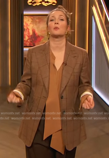 Drew’s brown tie neck blouse on The Drew Barrymore Show