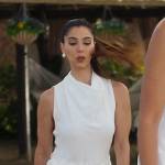 Elena’s white cowl neck jumpsuit on Fantasy Island