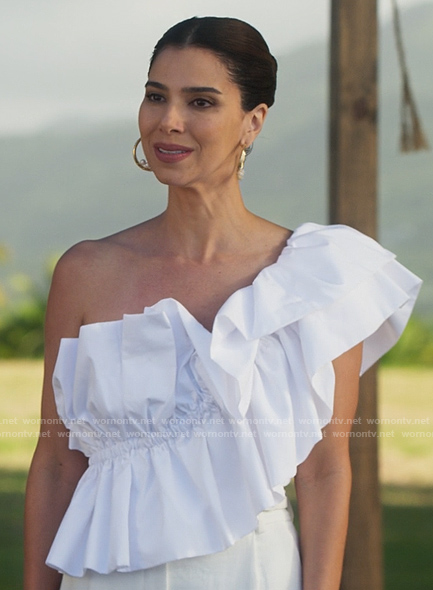 Elena's white ruffled one-shoulder top on Fantasy Island