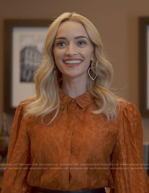 Georgia's orange leopard blouse and heart earrings on Ginny & Georgia