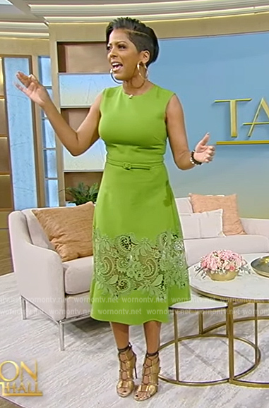 Tamron’s green lace inset sleeveless dress on Tamron Hall Show