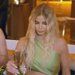 Alexia’s green satin cutout dress on The Real Housewives of Miami