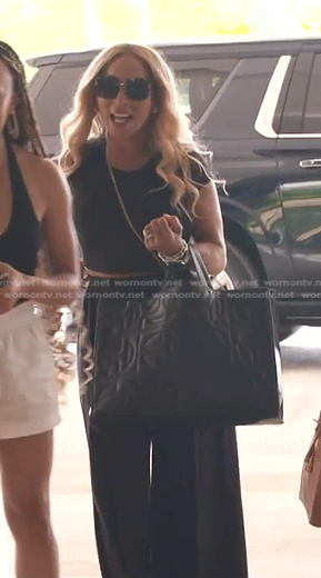 Karen's black tote bag on The Real Housewives of Potomac