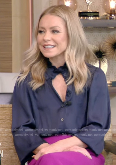 Kelly’s black ruffle neck blouse on Live with Kelly and Ryan