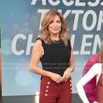 Kit’s black sleeveless knit top and red pants on Access Hollywood