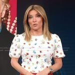 Kit’s white floral print puff sleeve top on Access Hollywood