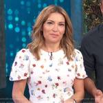 Kit’s white floral print puff sleeve top on Access Hollywood
