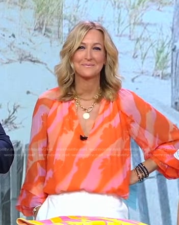 Lara’s pink and orange printed blouse on Good Morning America