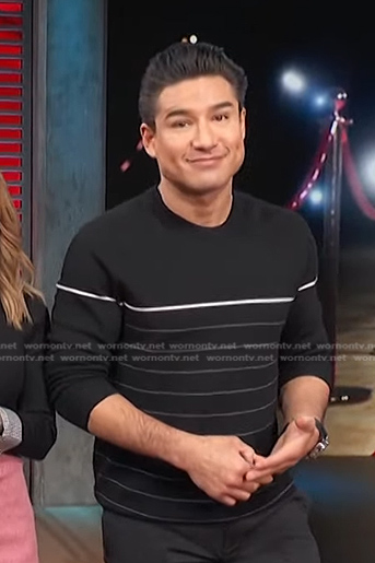 Mario Lopez’s black striped sweater on Access Hollywood