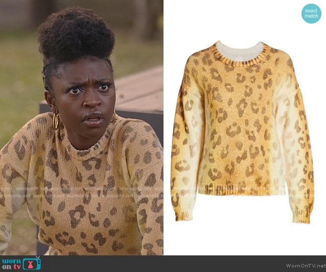 Mother Leopard Sweater worn by Tasha Rivers (Zuri Reed) on National Treasure: Edge of History