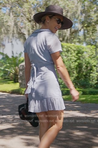 Nicole’s blue ruffle wrap mini dress on The Real Housewives of Miami